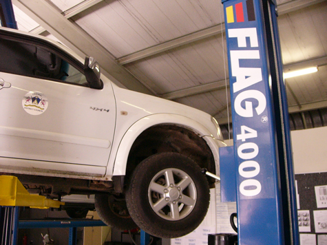 Testing garage equipment